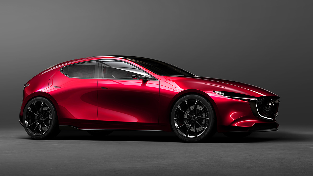 Foto de um Mazda Kai, com design definido e pintura vermelha.